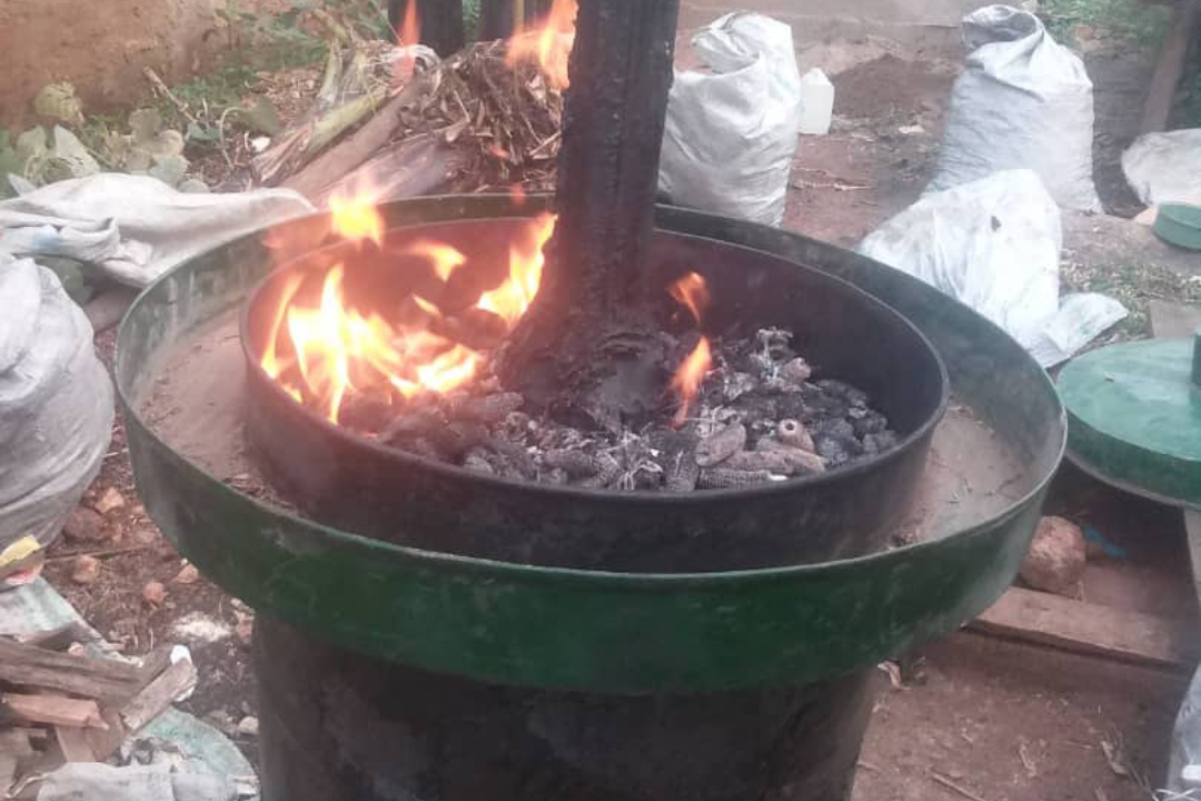 A biomass heat-processing activity using a metal drum